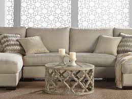 Anchor the living room with a modern coffee table. Essentials For Living Bella Antique Smoke Gray 30 Wide Round Coffee Table Esl8027sgryelm