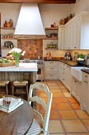 Slowing Down In French Country Kitchen Flooring Spanish Style Kitchen Kitchen Remodel