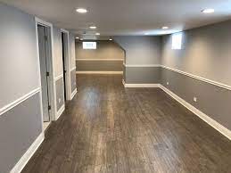 Great Job On This Finished Basement Two Toned Gray Walls With The Chair Railing Can Lighting Vinyl Flooring And White Grey Walls White Trim Grey Walls Home