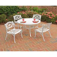 The chairs will stack for convenient storage in limited spaces. Biscayne White 48 Inch Round Outdoor Dining Table By Home Styles Patio Lawn Garden Tables Ekoios Vn