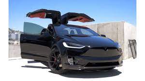 All black with figured ash wood décor as an interior color. Blacked Out Tesla Model X P100d By T Sportline Video