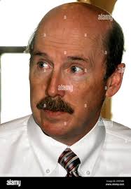 Illinois Rep. George Scully, D-Crete, takes a break from the House Democrat  caucus at the Illinois State Capitol in Springfield, Ill., Wednesday, May  30, 2007. (AP Photo/Seth Perlman Stock Photo
