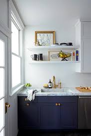 The black cabinets and the stainless steel hardware combine for a great timeless contemporary look. Floating Shelves Ideas For Every Room Better Homes Gardens