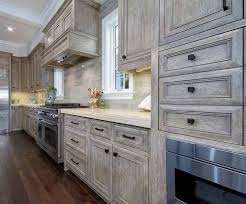Use the same pattern on each cabinet. Grey Whitewash Kitchen Cabinets Home Design Ideas