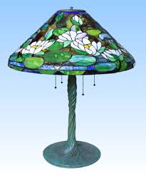 Featuring an italian carrara marble base, beveled corners, a stainless steel arch, crowned by a gorgeous. Stained Glass Tiffany Technique Replica Lamps Glass Art