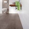 Wash with a garden hose or power washer to chase the dirt off of the mat. 1
