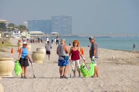 À pourville, les canadiens surprennent l'ennemi. Nettoyage Plage Hollywood Beach Floride Canadiens Consulat 6376 Le Courrier Des Ameriques