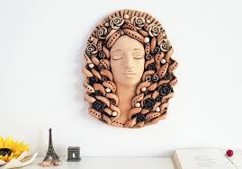 The leafy beard adds a realistic charm to it. Wall Art Decoration Ceramic Women Face Sculpture Wall Decor Sculpture By Ramune Savickyte Saatchi Art