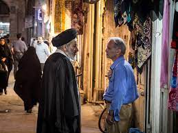 Two Men Discussing In Isfahan Bazar One Wearing Black Turban Meaning Hes A Sayyid Pr Syed A Descendent Of Prophet Muhammad According To Shia Islam Stock Photo Download Image Now Istock