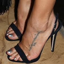 It is a positive colour and is for the most part beneficial, unless chosen directly after a first black ribbon, when it may indicate greed and jealousy! Foot Leg Tattoos 39 Celebs With Tattooed Feet And Ankles Heels Feet Foot Tattoos For Women