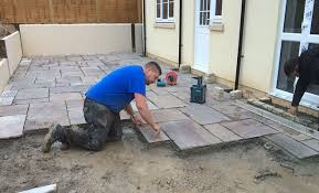 To avoid problems with the screed shrinking (and causing the tiles to crack), allow it to dry out for 1 to 2 weeks. How Much Does It Cost To Lay A Patio