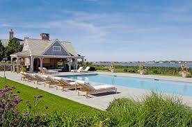 Add in a dining setting or a comfortable sofa setting where you can relax with friends and family. Hampton S Style Shingle Stone Pool Houzz