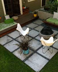 To ease up on lawn care, consider using faux grass for a treatment like this and you won't need to ever worry about mowing. 13 Clever Ways To Use Pavers In Your Backyard Apartment Therapy