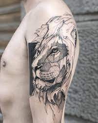 Pieces of the mane are shaded in. Sketch Work Lion Tattoo On The Left Upper Arm