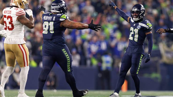 Warren Moon's heart is with the Seattle Seahawks in the NFC Championship  Game