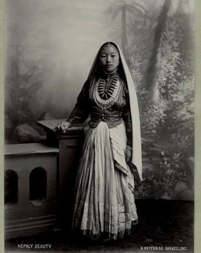 The women of Darjeeling seem strong and broad built. They wore heavy jewelers of gold or silver studded with corals and turquoise on top of their bakku. They made beautiful carpets and