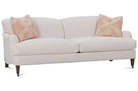 Its signature design element is a back comprised of pillows separate from the frame. Essie Designer Style Tight Back English Arm Fabric Sofa Collection