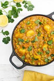 New Potato Pea Curry With Yellow Split Peas Vegan Https Theflexitarian Co Uk Recipe Potato And Pea Curry Pea Recipes Curry Recipes