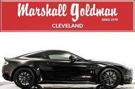 Image result for Marron Black 2017 Aston Martin