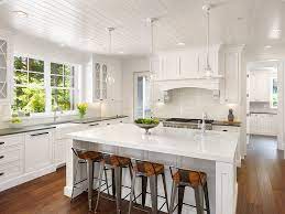 Painted pale blue, horizontal shiplap gives this farmhouse bedroom a serene feeling. Painting Your Kitchen Cabinets Two Day Painting