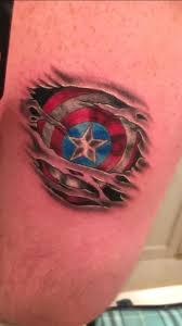 The original work on the captain american shield / winter soldier shoulder tattoo, as well as other additions to the sleeve of nerdom in progress. Captain America Shield By Cohwen At Cohwen Tattoos In The Villas Nj Tattoos