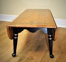 A beautiful home deserves a beautiful dining table where family and friends can get together. Vintage Ethan Allen Solid Maple Harvest Drop Leaf Coffee Table River Valley Estate Sales Llc