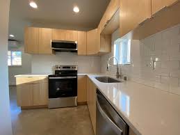 Gray granite tops are finished to a high gloss. Tacoma Interior Remodels Wilder Outdoor Spaces