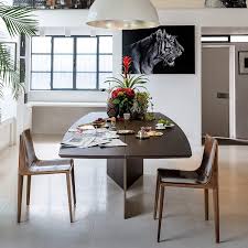Gary is a metropolitan metal dining table with wooden top and extension leaves; Contemporary Dining Table Epsilon Arketipo Oak Sucupira Metal