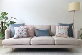 Garren standard loveseat + the lexington collection is for truly authentic living in comfort and cool via this stunning stationary sofa set. Grey Sofa With Pastel Cushions In Pink Grey And Blue Cushions On Sofa Scatter Cushions Cushion Arrangement