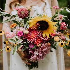 A bouquet with bright, pink and full peonies. 15 Sunflower Wedding Bouquets