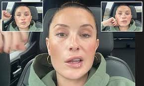 Zoo Weekly model April Vaughan strips to a bikini