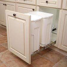 A trash can cabinet is a piece of moveable furniture that contains one or more garbage cans and is used for hiding trash cans out of sight in the kitchen. What Is Trash Pull Out Cabinet Definition Of Trash Pull Out Cabinet