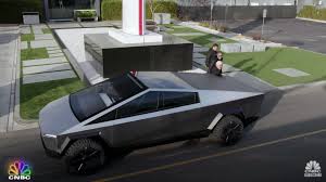 According to tesla, the truck was designed to have the utility of a truck and the performance of a sports car. Full Video Watch Jay Leno And Elon Musk Drive Tesla S Cybertruck In L A Iphone In Canada Blog