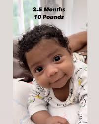 Our little angel is growing up fast! Born as a 4.11 pound premie we can  remember when she fit in the palm of our hand. Now she is a beautiful 13  pounder