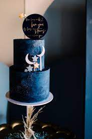 Ethereal Blue Wedding Cake With Moons Stars Quote Topper In 2021 Blue Birthday Cakes Wedding Cakes Blue Galaxy Cake