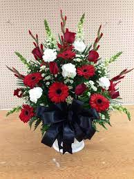 Alter Arrangement Church Flowers Red White And Black Gerber Daisies Roses Carna Red Flower Arrangements Large Flower Arrangements Flower Arrangements Diy