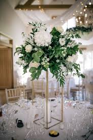 Check spelling or type a new query. Romantic Wedding Breakfast In The Barn At Cotswold Wedding Venue Hyde House White Floral Centerpieces Wedding Floral Centerpieces Flower Centerpieces Wedding