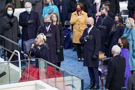 Lady gaga took to the presidential podium this morning to sing the american national anthem. Inauguration Lady Gaga Gives Twitter Hunger Games Vibes Los Angeles Times