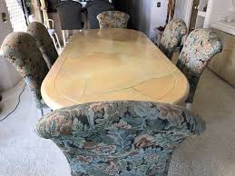 I took an old dining room table i didn't like anymore, printed out copies of all of my favorite album covers, and decoupaged the table with modge podge glue. Custom Dining Table With Decoupage Top And Eight Upholstered Dining Chairs 108l X 43w X 29 5h