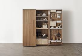 This kitchen island features a towel rack, spice rack, one spacious drawer and enclosed cabinet space with one shelf. Bulthaup B2 Kitchen Tool Cabinet By Bulthaup Stylepark