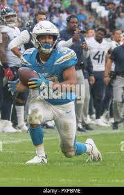 Los Angeles Chargers running back Larry Roundtree III (34) participates in  drills during a combined NFL practice with the Dallas Cowboys at the Los  Angeles Rams' practice facility in Costa Mesa, Calif.