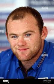 Wayne talks to hi-res stock photography and images