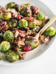 Christmas Roasted Brussels Sprouts With Bacon And Cranberries Recipe Sprouts With Bacon Brussel Sprouts Thanksgiving Brussel Sprouts