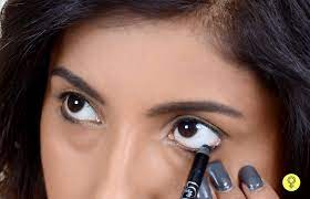 Apply a gentle stroke of kajal to the step 4: How To Apply Kajal On Eyes Perfectly Step By Step Tutorial