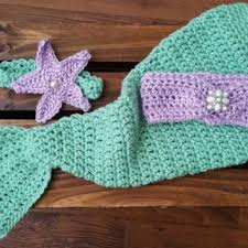 The tail is made up of two halves and then sewn together to form the shape. Free Crochet Pattern For Newborn Mermaid Outfit Dancox For Crochet Mermaid Baby Outfit P Mermaid Crochet Pattern Baby Mermaid Crochet Crochet Baby Outfits Girl