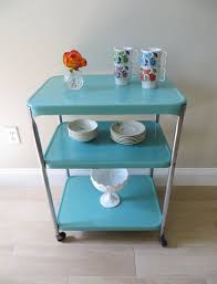 Go industrial with this vintage style factory cart on wheels made of solid metal with a galvanized metal top. Vintage Mid Century Cosco Utility Cart Three Tier Rolling Metal Serving Cart Chrome Enamel Aqua Turquoise Blue Retro Cart Cosco Vintage Kitchen Metal Cart