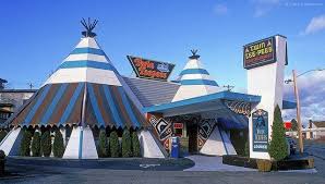Twin TeePees was at 7201 Aurora Ave N until 2000. This is a fave foto  showing the blend of Plains Native motif with NW Coastal art at the entry  way. Inside the
