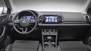 The black interior and headliner enhance the sporty interior style. Skoda Karoq Dimensions Boot Space And Interior