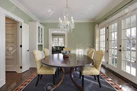 This idea that is dining room interiors sliding rustic interior barn doors may be really challenging and intimidating, but you will be helped by our specialist enormously. Dining Room With Green Walls And Door To Deck Stock Photo Picture And Royalty Free Image Image 10292847