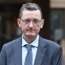 Taxi union boss denies 'assaulting' ears of police with megaphone